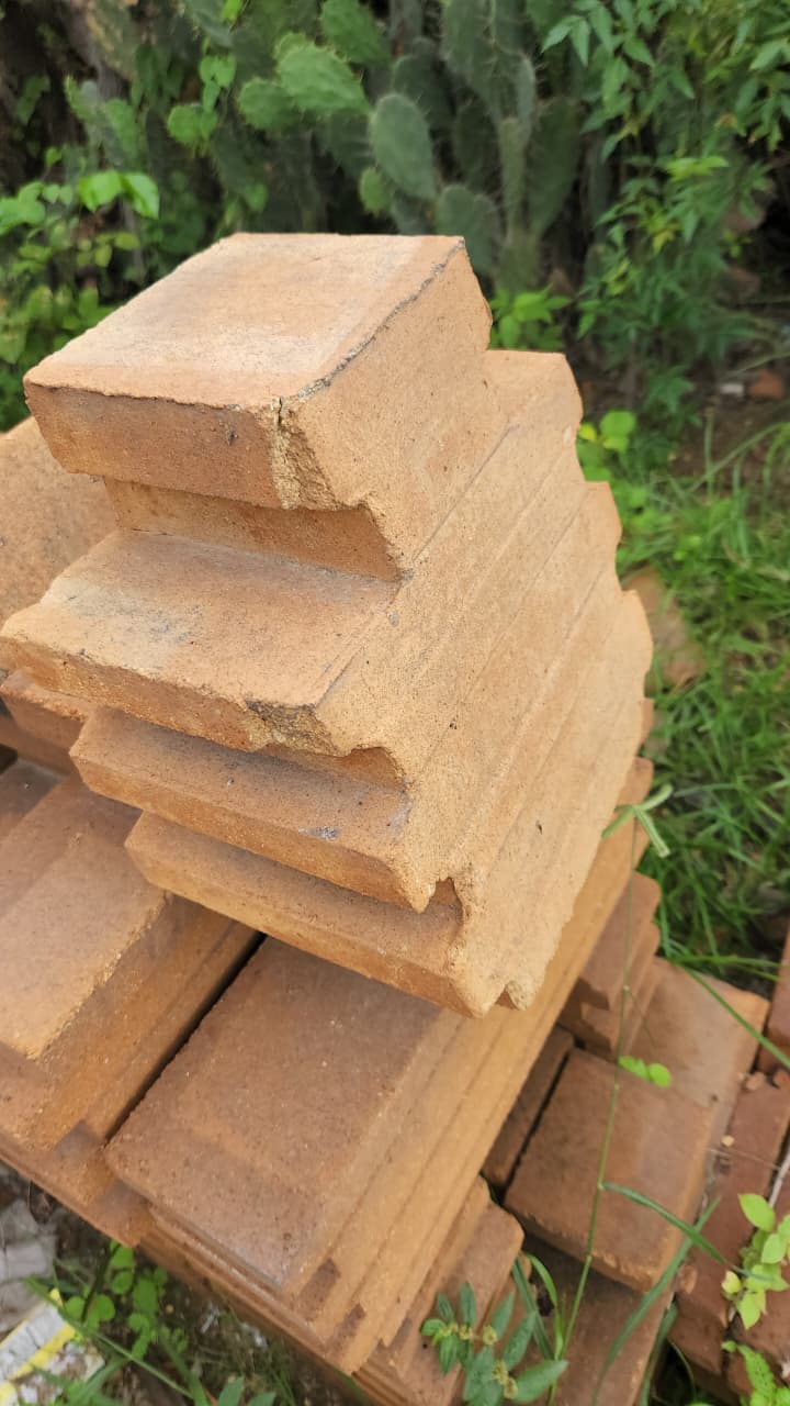 Stepped refractory bricks stacked outdoors